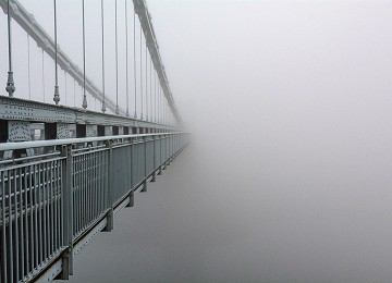 Disappearing Menai Suspension Bridge in the fog