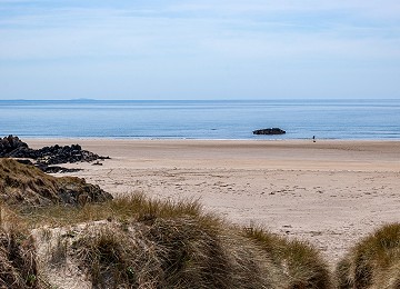 The far end of Aberffraw beach looking down the Llyn Peninsula