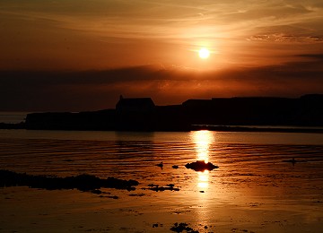 Big sunset over st cwyfan's